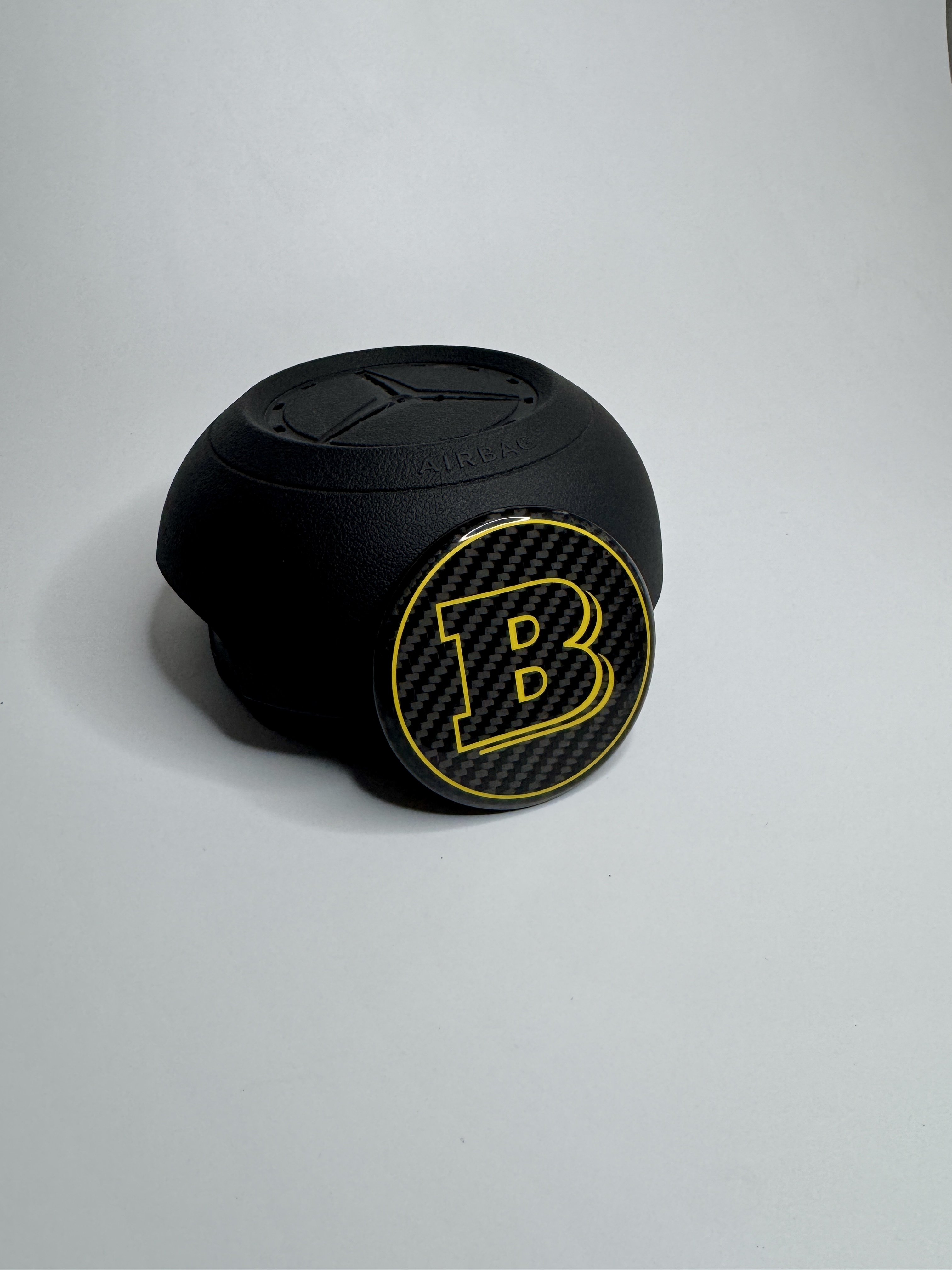 Emblemat Brabus Yellow na poduszce powietrznej do Mercedesa G-Class 2024+