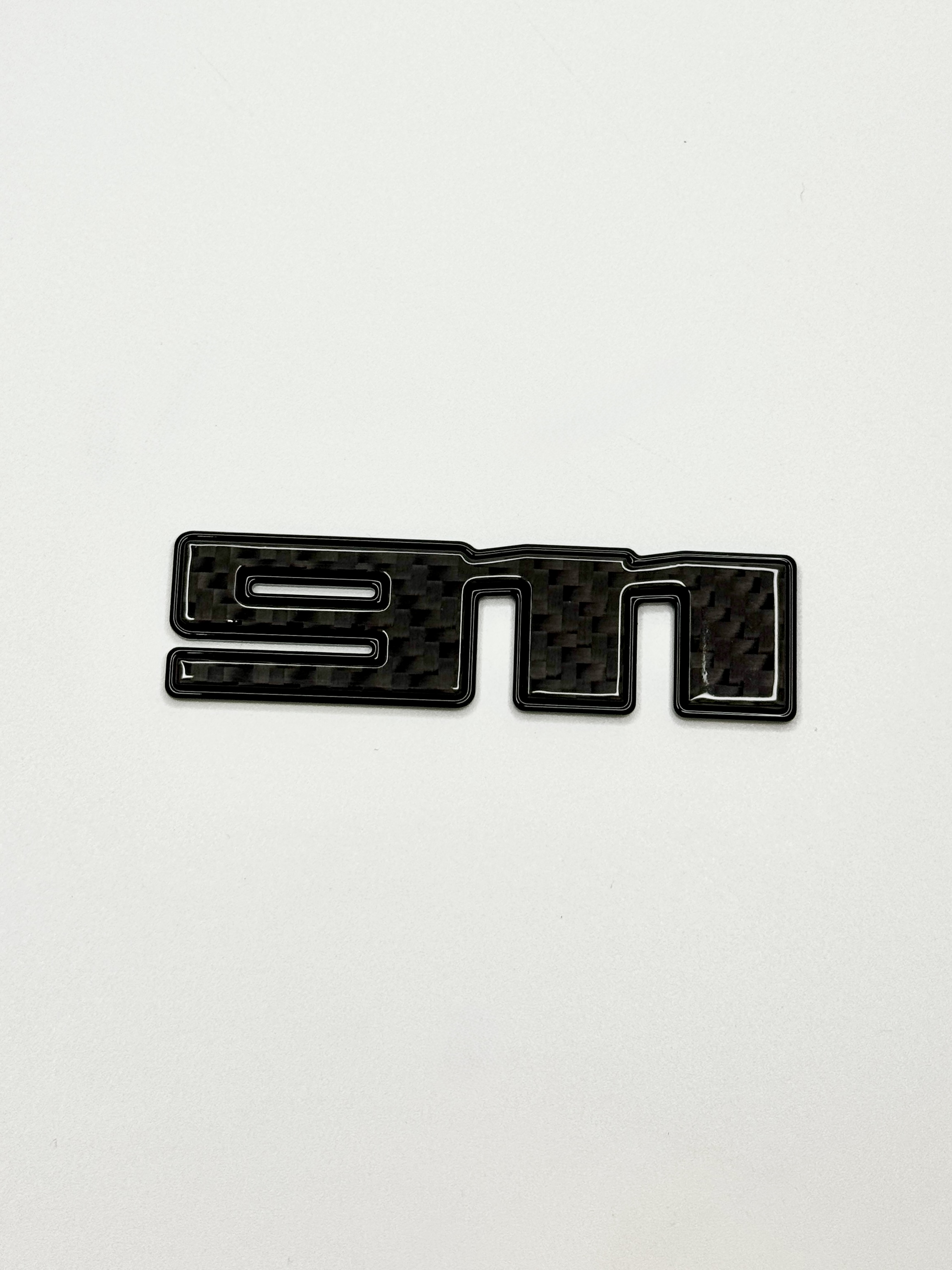 Emblemat 911 black metal i carbon do Porsche 992