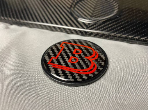 Metalowy emblemat maski Mercedes-Benz W463A W464 G-Class styl Brabus red 55 mm