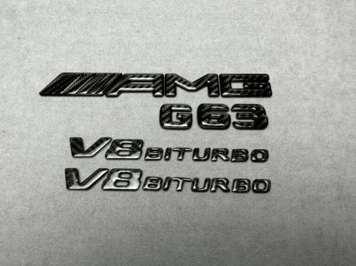 Zestaw emblematów AMG V8 Biturbo G63 metal czarny i karbon wykonany dla Mercedes Benz