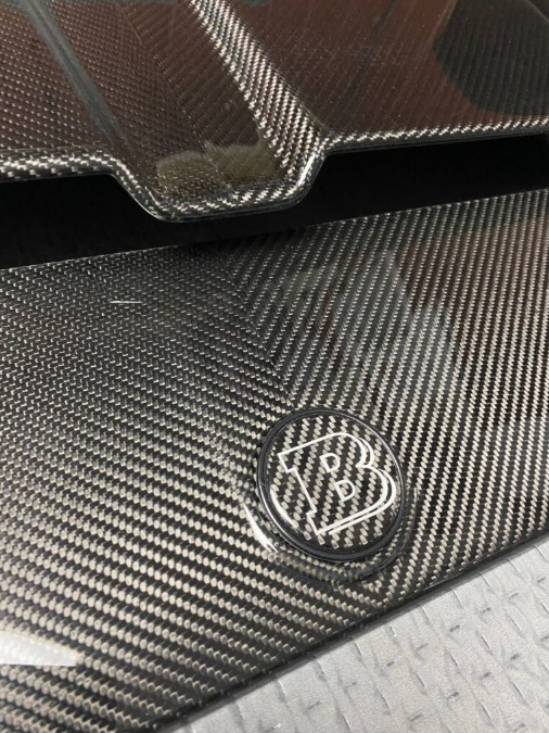 Metalowy emblemat maski Mercedes-Benz W463A W464 G-Class styl Brabus grey 55 mm