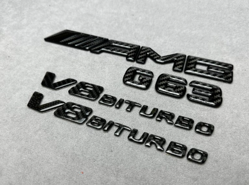 Zestaw emblematów AMG V8 Biturbo G63 metal czarny i karbon wykonany dla Mercedes Benz