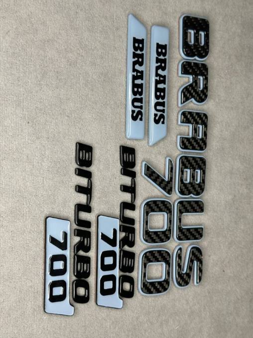 Zestaw emblematów Mercedes-Benz W463A W464 2018-2024 G-klasa styl Brabus 700 Light blue