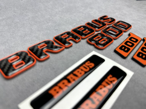 Zestaw emblematów Mercedes-Benz W463A W464 2018-2024 G-klasa styl Brabus 800 orange