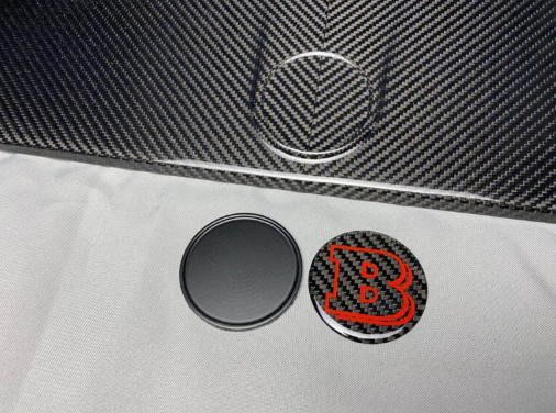 Metalowy emblemat maski Mercedes-Benz W463A W464 G-Class styl Brabus red 55 mm