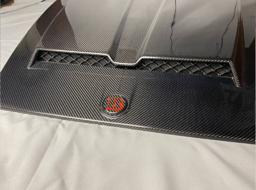 Metalowy emblemat maski Mercedes-Benz W463A W464 G-Class styl Brabus red 55 mm